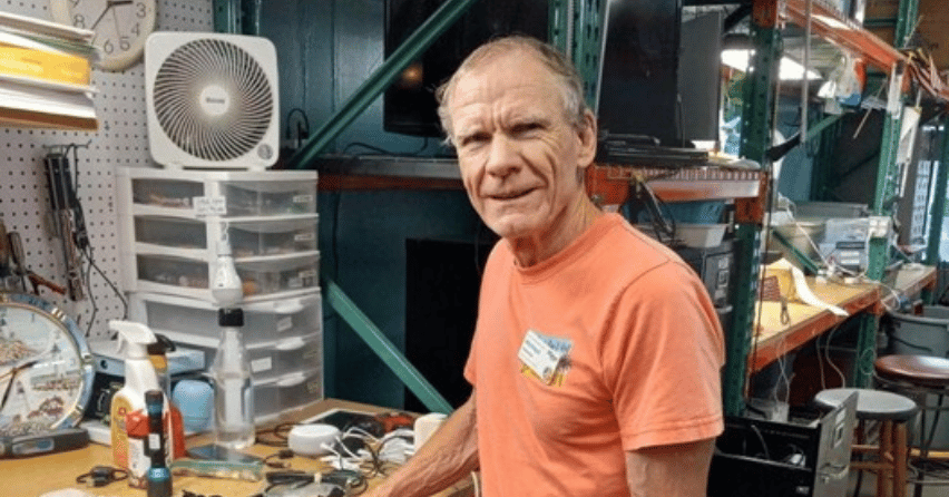 Volunteer spotlight featuring Mike Dempsey refurbishing electronics at The Sharing Center